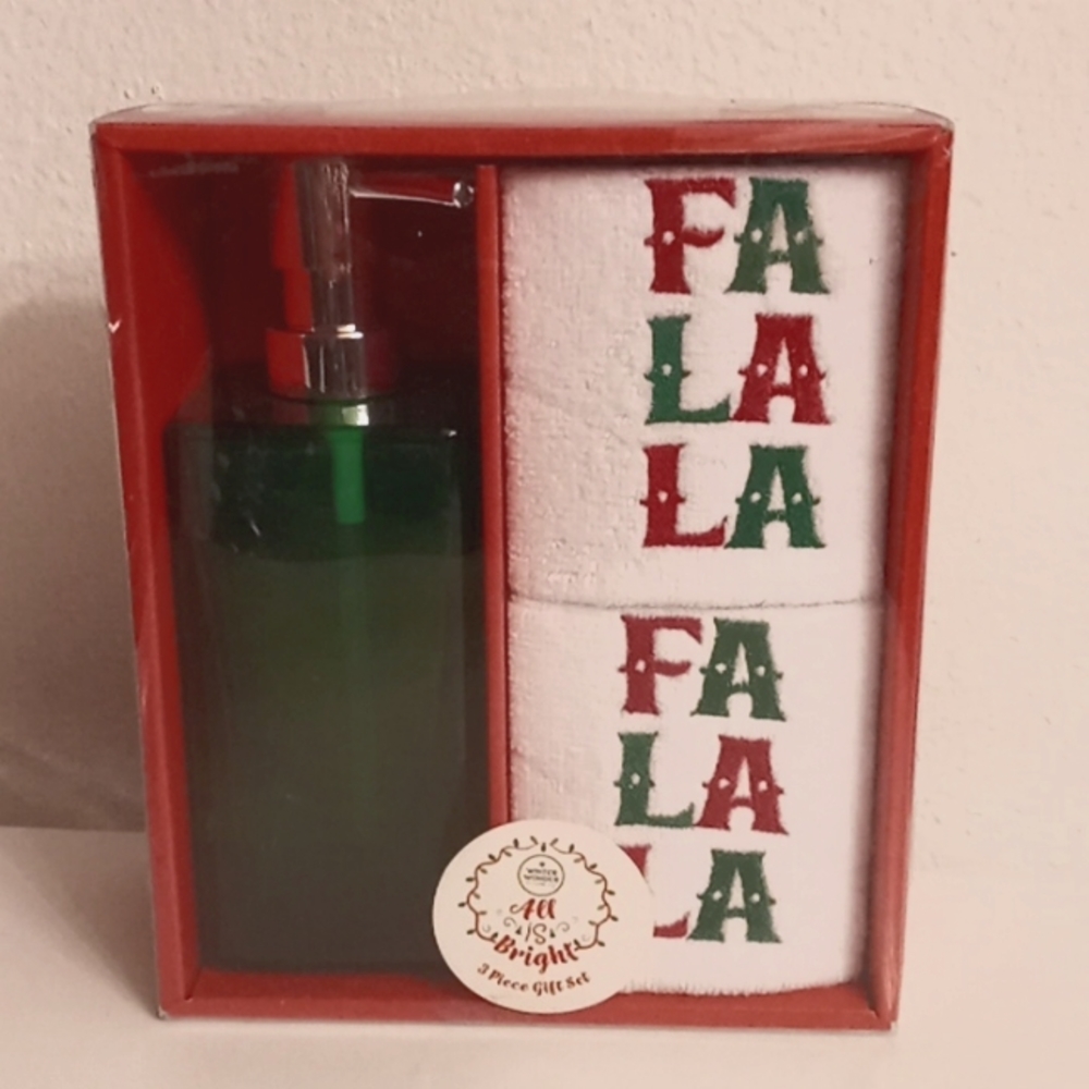 New glass soap dispenser and towels